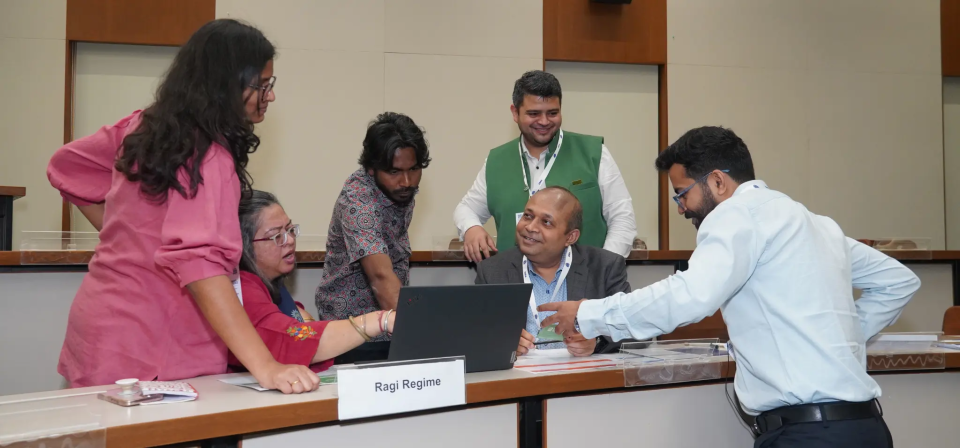 Figure 1: Event attendees playing the FABLE Serious Game at IIMA.